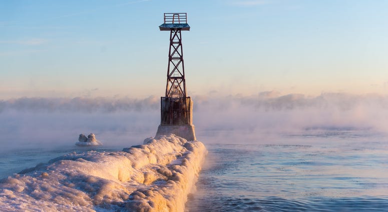 Chicago’s lakefront is frozen over Friday morning as temperatures drop below zero, Friday, Jan. 25, 2019, in Chicago.