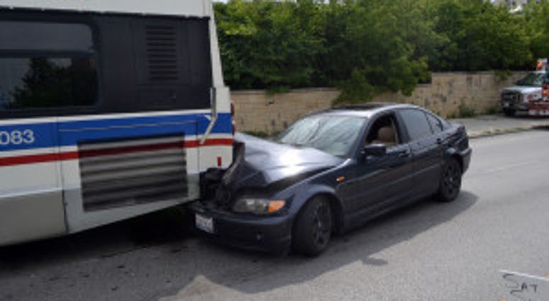 A car rear-ended a bus, Aug. 17, 2019, in Hyde Park on the South Side. A car rear-ended a bus, Aug. 17, 2019, in Hyde Park on the South Side.