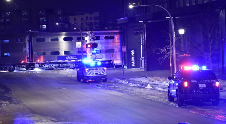 Authorities investigate the scene where a Metra train struck a car Jan. 19, 2020 in West Town. Authorities investigate the scene where a Metra train struck a car Jan. 19, 2020 in West Town.