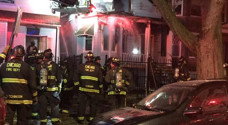 Crews were battling the blaze about 11:45 p.m. at a residence in the 1600 block of North Spaulding Avenue, according to Chicago Fire Department officials. Crews were battling the blaze about 11:45 p.m. at a residence in the 1600 block of North Spaulding Avenue, according to Chicago Fire Department officials.