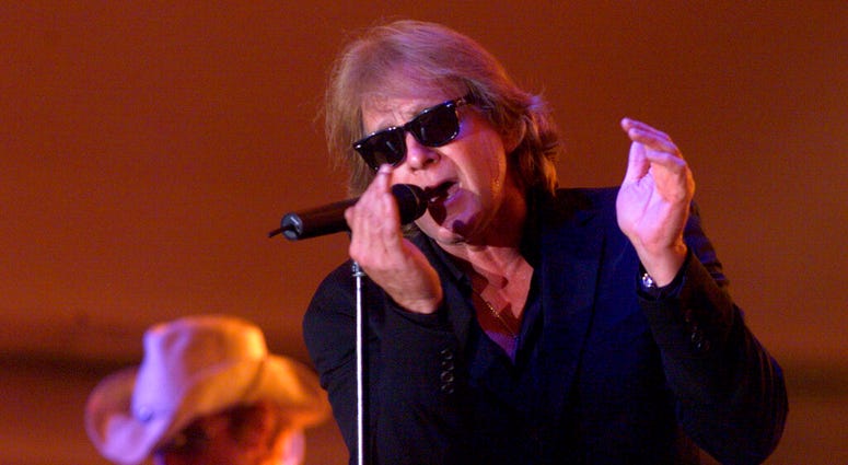 In this Aug. 6, 2004 file photo, Eddie Money performs during Grandstand Under the Stars at the Diamond Jo Casino in Dubuque, Iowa. In this Aug. 6, 2004 file photo, Eddie Money performs during Grandstand Under the Stars at the Diamond Jo Casino in Dubuque, Iowa.