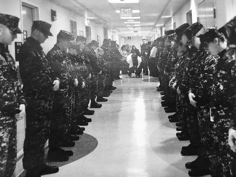 As part of the "No Veteran Dies Alone" program, volunteers, those in uniform and sometime hospital staff at Lovell will line up on both side of the hallway where the veteran will be moved through after their death for a final salute and a final goodbye.