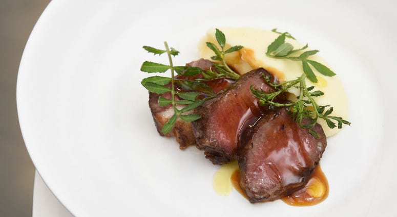 A view of the Roasted New Zealand Lamb by James Beard Award Winning Chef and restaurateur David Chang, during an immersive culinary experience hosted by American Express Travel and David Chang, at Lightbox on November 14, 2018 in New York City. A view of the Roasted New Zealand Lamb by James Beard Award Winning Chef and restaurateur David Chang, during an immersive culinary experience hosted by American Express Travel and David Chang, at Lightbox on November 14, 2018 in New York City.