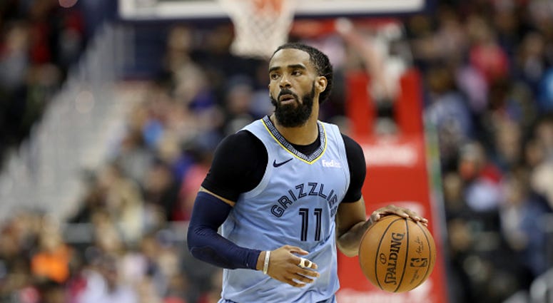 Mike Conley Mike Conley of the Memphis Grizzlies dribbles the ball in a game against the Wizards.