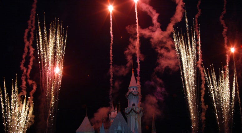 A fireworks display is seen during the holiday lighting ceremony at Disneyland on November 25, 2003 in Anaheim, California. A fireworks display is seen during the holiday lighting ceremony at Disneyland on November 25, 2003 in Anaheim, California.