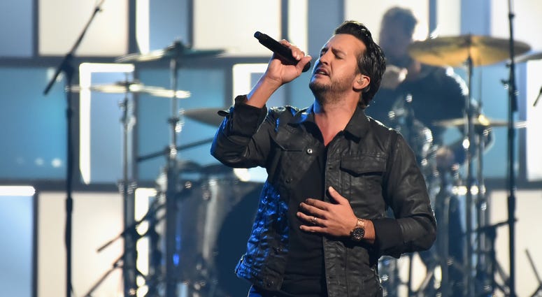 Luke Bryan performs onstage at the 51st annual CMA Awards at the Bridgestone Arena on November 8, 2017 in Nashville, Tennessee. ( Luke Bryan performs onstage at the 51st annual CMA Awards at the Bridgestone Arena on November 8, 2017 in Nashville, Tennessee. (