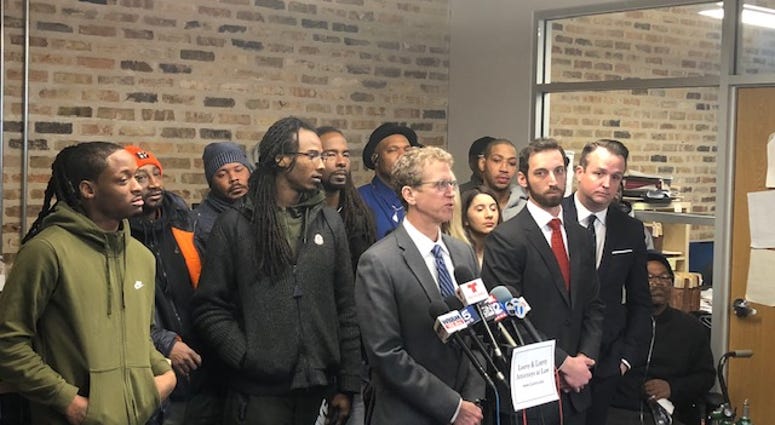 Attorney Jon Loevy stood with most of the 19 plaintiffs, all alleging they were targets of corrupt ex-sergeant Ronald Watts and his crew.
