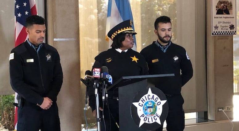 Two young Chicago police officers are being recognized for their actions at the scene of a fiery, roll-over crash with a child trapped inside. Two young Chicago police officers are being recognized for their actions at the scene of a fiery, roll-over crash with a child trapped inside.
