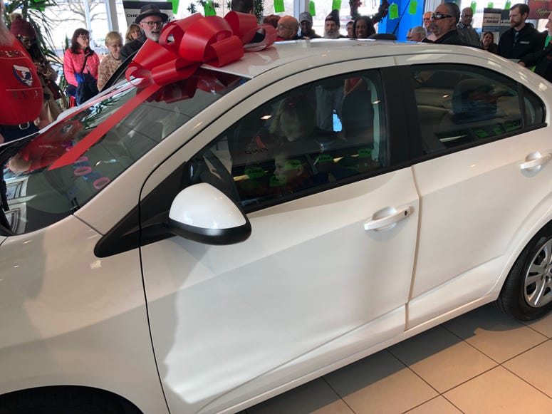 A family of five from Crete won a Chevy Sonic after submitting an essay on why winning a car would change their lives.