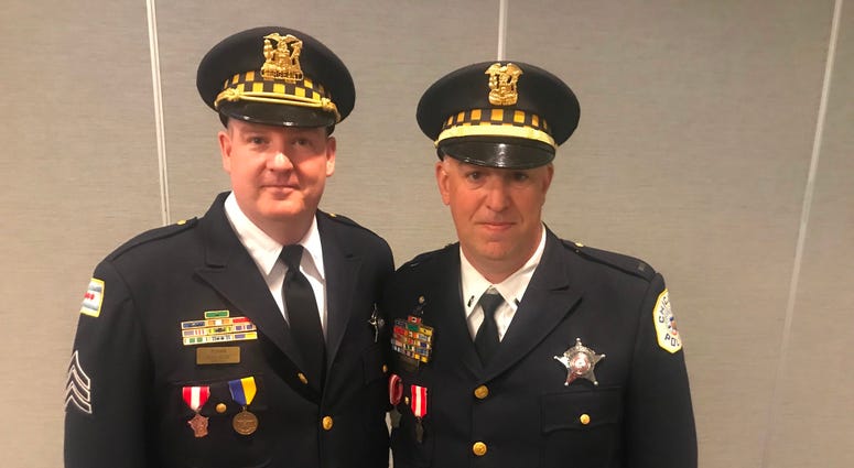 Sgt. Sean Ronan (left) with Lt. Wayne Wiberg, who received the Superintendent's Award of Tactical Excellence