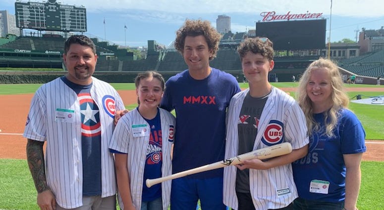 A Park Ridge cancer survivor and young baseball star spent the morning at Wrigley Field hanging out with his favorite player. A Park Ridge cancer survivor and young baseball star spent the morning at Wrigley Field hanging out with his favorite player.
