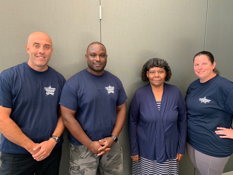 Officer Daniel Gray, Officer Ray Morris, Founder/director Pam Bradley, Officer Nikole Petersen Officer Daniel Gray, Officer Ray Morris, Founder/director Pam Bradley, Officer Nikole Petersen