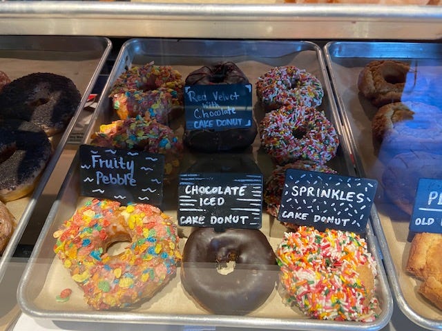 Joe Donut's pastry chef, bakers, and servers taste test new creations before they are sold to customers. Joe Donut staples include the maple bacon donut, a s'mores donut, and a donut that's covered in Fruity Pebbles cereal. It also has seasonal flavors. Joe Donut's pastry chef, bakers, and servers taste test new creations before they are sold to customers. Joe Donut staples include the maple bacon donut, a s'mores donut, and a donut that's covered in Fruity Pebbles cereal. It also has seasonal flavors.