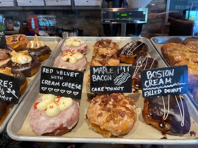Joe Donut's pastry chef, bakers, and servers taste test new creations before they are sold to customers. Joe Donut staples include the maple bacon donut, a s'mores donut, and a donut that's covered in Fruity Pebbles cereal. It also has seasonal flavors. Joe Donut's pastry chef, bakers, and servers taste test new creations before they are sold to customers. Joe Donut staples include the maple bacon donut, a s'mores donut, and a donut that's covered in Fruity Pebbles cereal. It also has seasonal flavors.