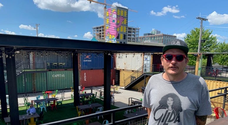 Chicago artist and muralist Mosher spent nine days a top a boom lift creating a giant, colorful mural that welcomes patrons to Recess, Fulton Market's largest outdoor patio. Chicago artist and muralist Mosher spent nine days a top a boom lift creating a giant, colorful mural that welcomes patrons to Recess, Fulton Market's largest outdoor patio.