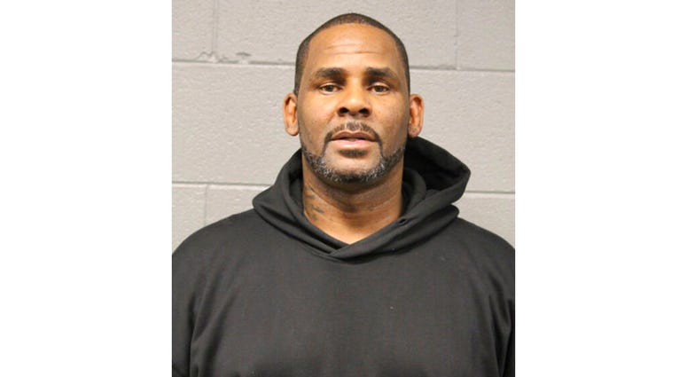 In this photo taken and released by the Chicago Police Dept., Friday, Feb. 22, 2019, R&B singer R. Kelly is photographed during booking at a police station in Chicago, Ill. In this photo taken and released by the Chicago Police Dept., Friday, Feb. 22, 2019, R&B singer R. Kelly is photographed during booking at a police station in Chicago, Ill.