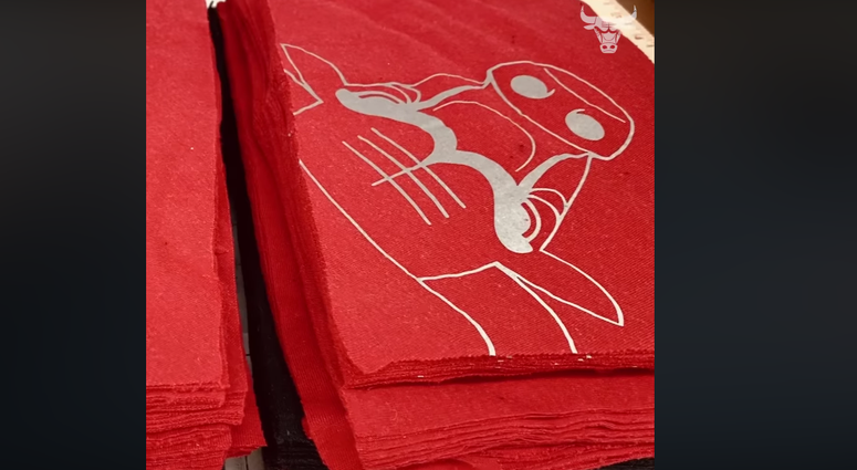 The Chicago Bulls teamed up with BMO Harris Bank to upcycle surplus Bulls apparel into 10,000 face coverings to be donated to community partners. The Chicago Bulls teamed up with BMO Harris Bank to upcycle surplus Bulls apparel into 10,000 face coverings to be donated to community partners.
