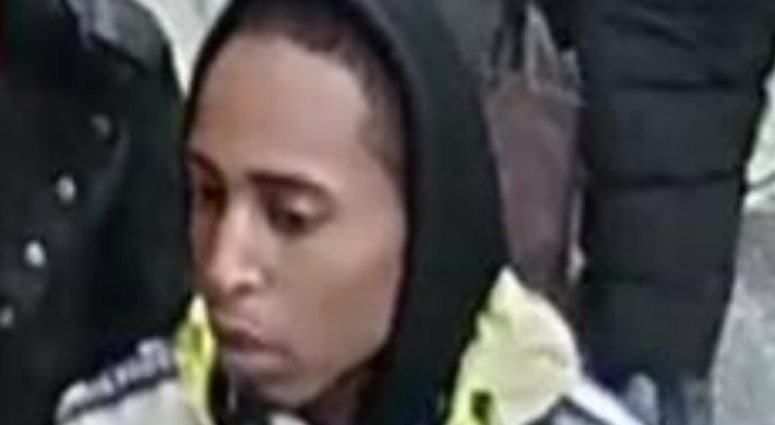 Surveillance photo released Feb. 17, 2020, of a person of interest wanted in connection with a shooting on a Blue Line train. Surveillance photo released Feb. 17, 2020, of a person of interest wanted in connection with a shooting on a Blue Line train.