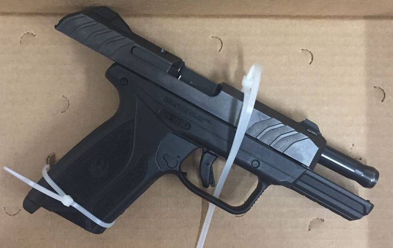 Police say they confiscated this gun from Yonatan Wondimu during a traffic stop June 28, 2019 in Evanston. Police say they confiscated this gun from Yonatan Wondimu during a traffic stop June 28, 2019 in Evanston.