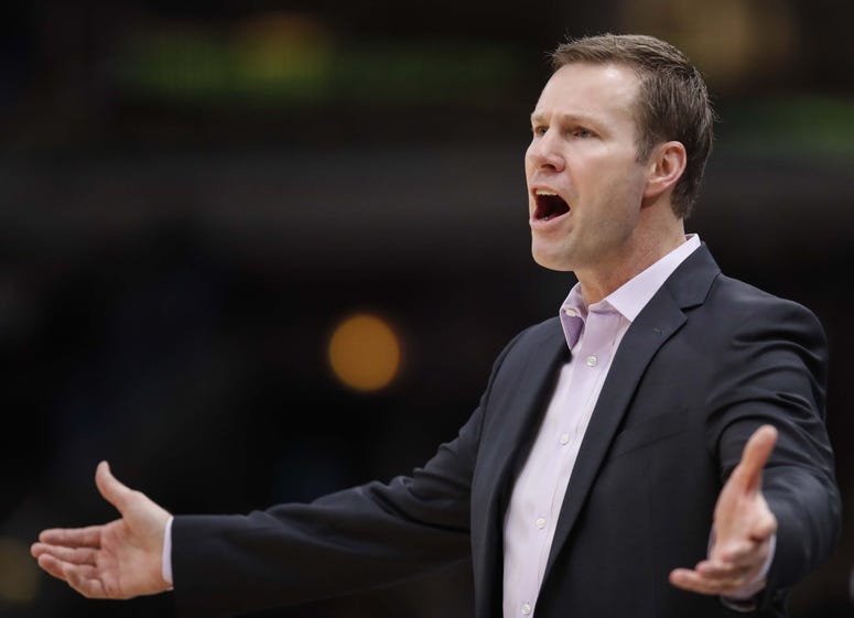 Chicago Bulls head coach Fred Hoiberg protests a call against his team during the first half at United Center.