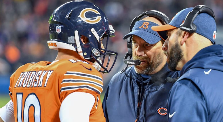 Chicago Bears head coach Matt Nagy talks with quarterback Mitchell Trubisky (10) in the first quarter against the Minnesota Vikings at Soldier Field.