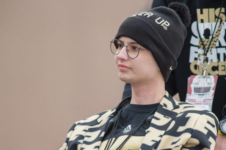 Purdue Boilermakers fan and coin flip participant Tyler Trent looks on from on the field before a game against the Indiana Hoosiers at Memorial Stadium.