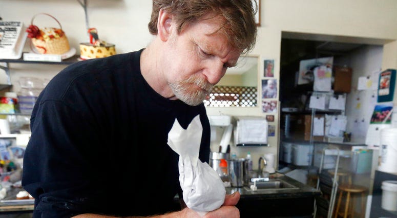 In this March 10, 2014, file photo, Masterpiece Cakeshop owner Jack Phillips decorates a cake inside his store in Lakewood, Colo. The Supreme Court is setting aside a Colorado court ruling against a baker who wouldn’t make a wedding cake for a same-sex c In this March 10, 2014, file photo, Masterpiece Cakeshop owner Jack Phillips decorates a cake inside his store in Lakewood, Colo. The Supreme Court is setting aside a Colorado court ruling against a baker who wouldn’t make a wedding cake for a same-sex c
