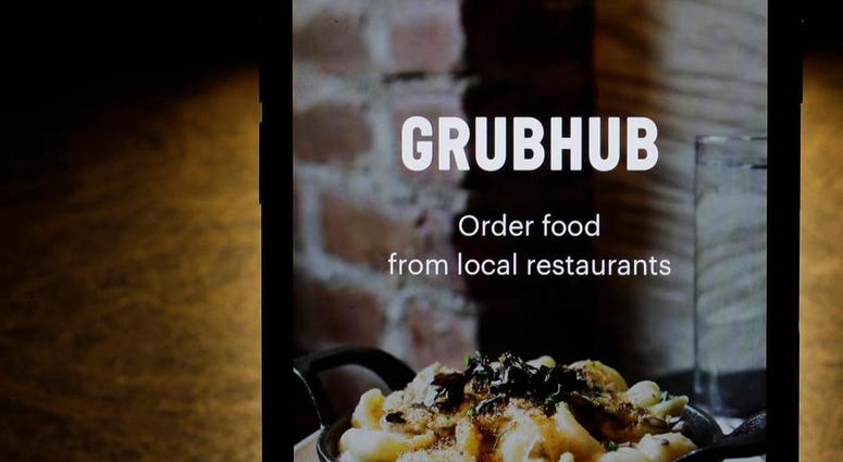 Grubhub app on an iPhone in Chicago. Grubhub app on an iPhone in Chicago.