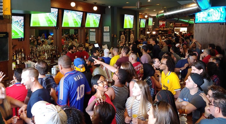 Fans take in the World Cup final at the Globe Pub on Sunday, Jul 15, 2018.