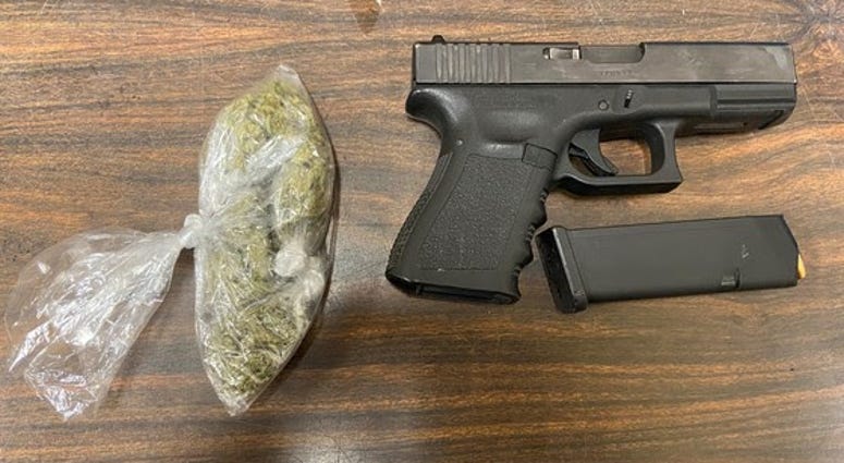 A gun and 17 grams of cannabis were recovered from a rollover crash following a police chase Dec. 28, 2019, in northwest Indiana. | Indiana State Police
