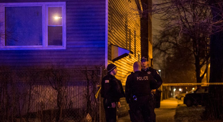 Chicago Police investigate to people shot killed in a home at Cortland and Lawndale about 4:45 a.m. Monday, April 16. Chicago Police Logan Square Shooting