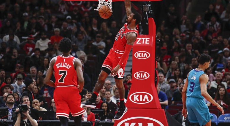 Apr 3, 2018; Chicago, IL, USA; Chicago Bulls guard Sean Kilpatrick (0) dunks the ball against the Charlotte Hornets during the second half at United Center.