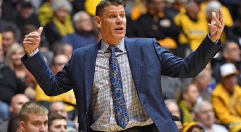 Jan 11, 2017; Wichita, KS, USA; Loyola-Chicago Ramblers head coach Porter Moser calls out instructions against the Wichita State Shockers during the first half at Charles Koch Arena.