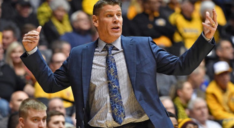 Jan 11, 2017; Wichita, KS, USA; Loyola-Chicago Ramblers head coach Porter Moser calls out instructions against the Wichita State Shockers during the first half at Charles Koch Arena.