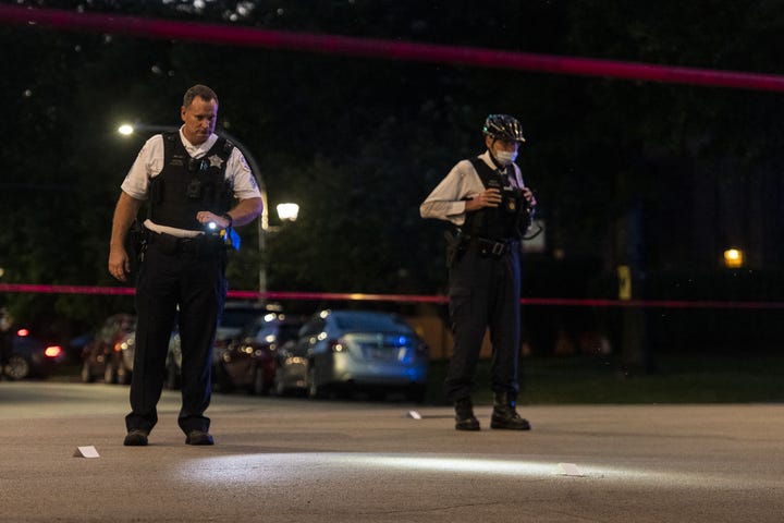 Chicago police investigate the scene of a shooting July 1, 2020, in the 7300 block of North Sheridan Road. Chicago police investigate the scene of a shooting July 1, 2020, in the 7300 block of North Sheridan Road.