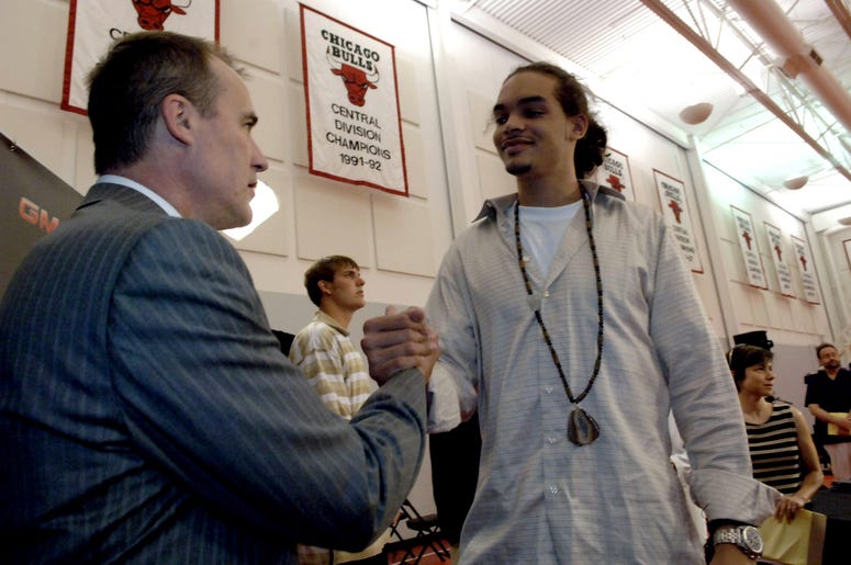 John Paxson, the executive vice president of basketball operations for the Chicago Bulls, welcomes Joakim Noah in Deerfield, Illinois, Monday, July 2, 2007.