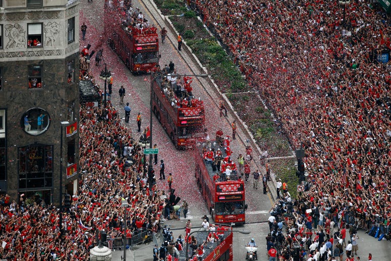 Crowds fill the streets of Chicago, Illinois, during the parade and celebration for the Chicago Blackhawks Stanley Cup victory, Friday, June 11, 2010.