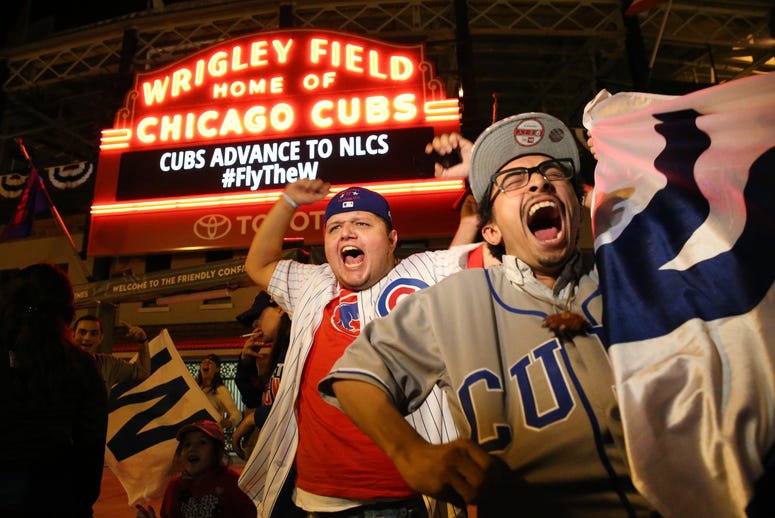 Chicago Cubs fans gather outside Wrigley Field to celebrate the Cubs clinching game 4 of the NLDS series over the San Francisco Giants. on Tuesday, Oct. 11, 2016 in Chicago.