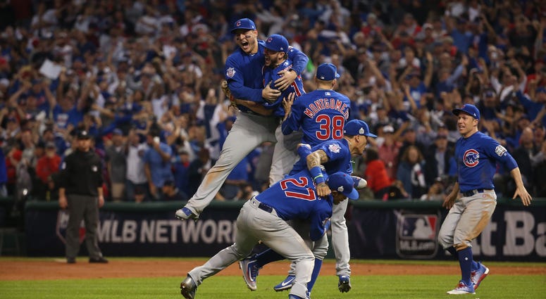 The Chicago Cubs celebrate after defeating the Cleveland Indians, Nov. 3, 2016 in Game 7 to win the World Series at Progressive Field in Cleveland, Ohio.