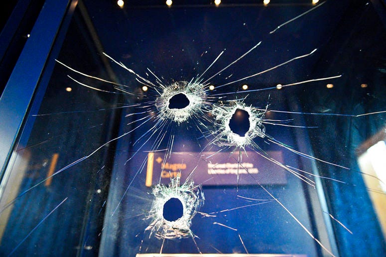 Hammer holes in the glass case that housed the Magna Carta, at Salisbury Cathedral after a 45-year-old man has been arrested on suspicion of its attempted theft, in Salisbury, England, Friday Oct. 26, 2018.