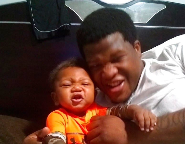 This photo provided by Avontea Boose shows her baby Tristan Roberson and the boy's father Jemel Roberson.