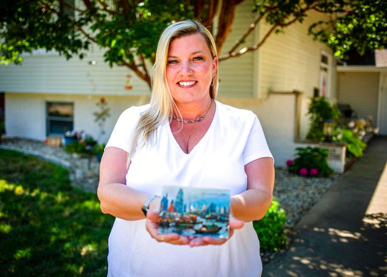 Kim Draper received a postcard at her home in Springfield on July 8, 2019 that was postmarked and sent from Hong Kong exactly 26 years ago on July 8, 1993 to a previous family that lived at her address. Kim Draper received a postcard at her home in Springfield on July 8, 2019 that was postmarked and sent from Hong Kong exactly 26 years ago on July 8, 1993 to a previous family that lived at her address.