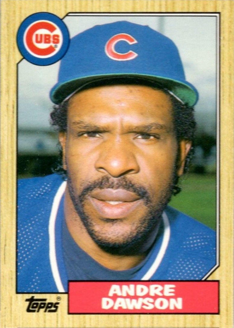 Beckett Baseball editor Mike Payne: “Isn’t that a great looking card? I love the wood border, and whenever I think of the ‘80s, this is the first card that I think of, this set, this ‘87 set. The Hawk won the MVP with a last-place Cubs team, which is sa Beckett Baseball editor Mike Payne: “Isn’t that a great looking card? I love the wood border, and whenever I think of the ‘80s, this is the first card that I think of, this set, this ‘87 set. The Hawk won the MVP with a last-place Cubs team, which is sa