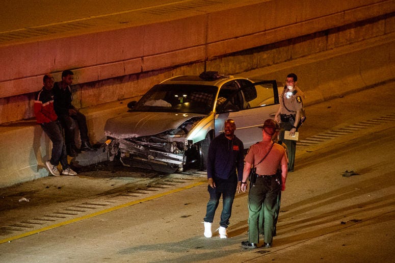 Chicago fire fighters operate on a person who was injured in a vehicle crash, Friday morning, in the out-bound local lanes of I-90 near 65th Street. Chicago fire fighters operate on a person who was injured in a vehicle crash, Friday morning, in the out-bound local lanes of I-90 near 65th Street.