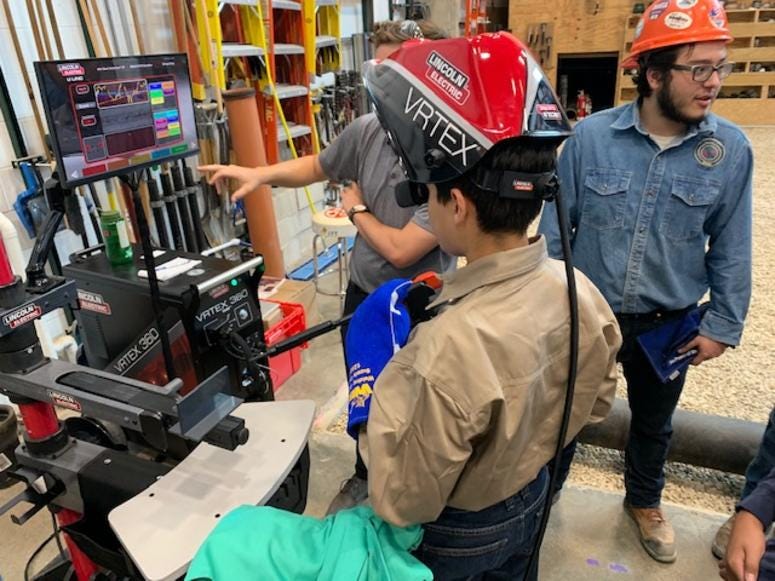 Chicago-area Boy and Girl Scouts spent the day at the Plumber's Union Local 130 earning career merit badges. Chicago-area Boy and Girl Scouts spent the day at the Plumber's Union Local 130 earning career merit badges.