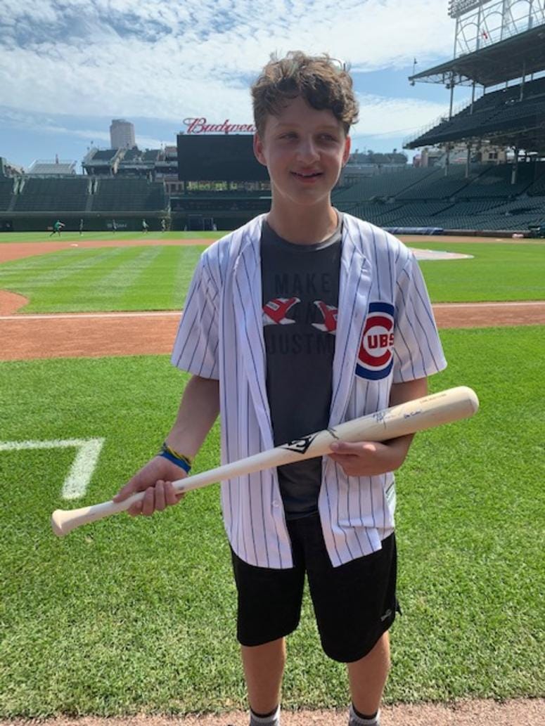 Dylan Provenzano with signed bat from Almora Dylan Provenzano with signed bat from Almora