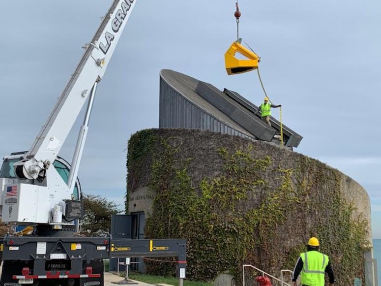 Wednesday marked a big day at the Alder Planetarium as a crane hoisted its giant telescope from its long-time home. Wednesday marked a big day at the Alder Planetarium as a crane hoisted its giant telescope from its long-time home.