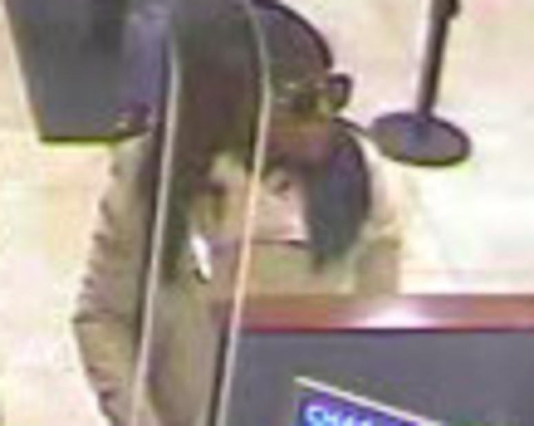 Surveillance image of a woman who robbed a Chase Bank branch April 6, 2019, at 3033 N. Pulaski Road. Surveillance image of a woman who robbed a Chase Bank branch April 6, 2019, at 3033 N. Pulaski Road.