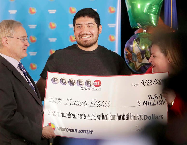 Manuel Franco of West Allis, Wis., winner of second-highest Powerball lottery in history, attends a news conference at the Wisconsin Department of Revenue in Madison, Wis. Manuel Franco of West Allis, Wis., winner of second-highest Powerball lottery in history, attends a news conference at the Wisconsin Department of Revenue in Madison, Wis.