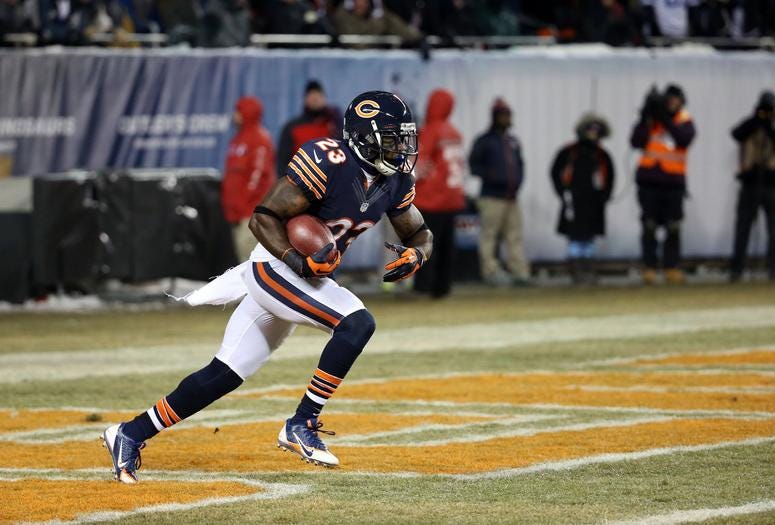 Chicago Bears wide receiver Devin Hester (23) returns the opening kickoff against the Dallas Cowboys at Soldier Field on Monday, Dec. 9, 2013 in Chicago.